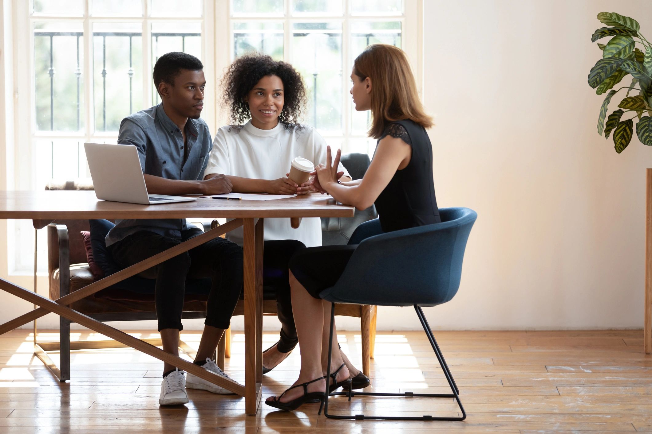 Family meeting with an advisor to review health coverage options