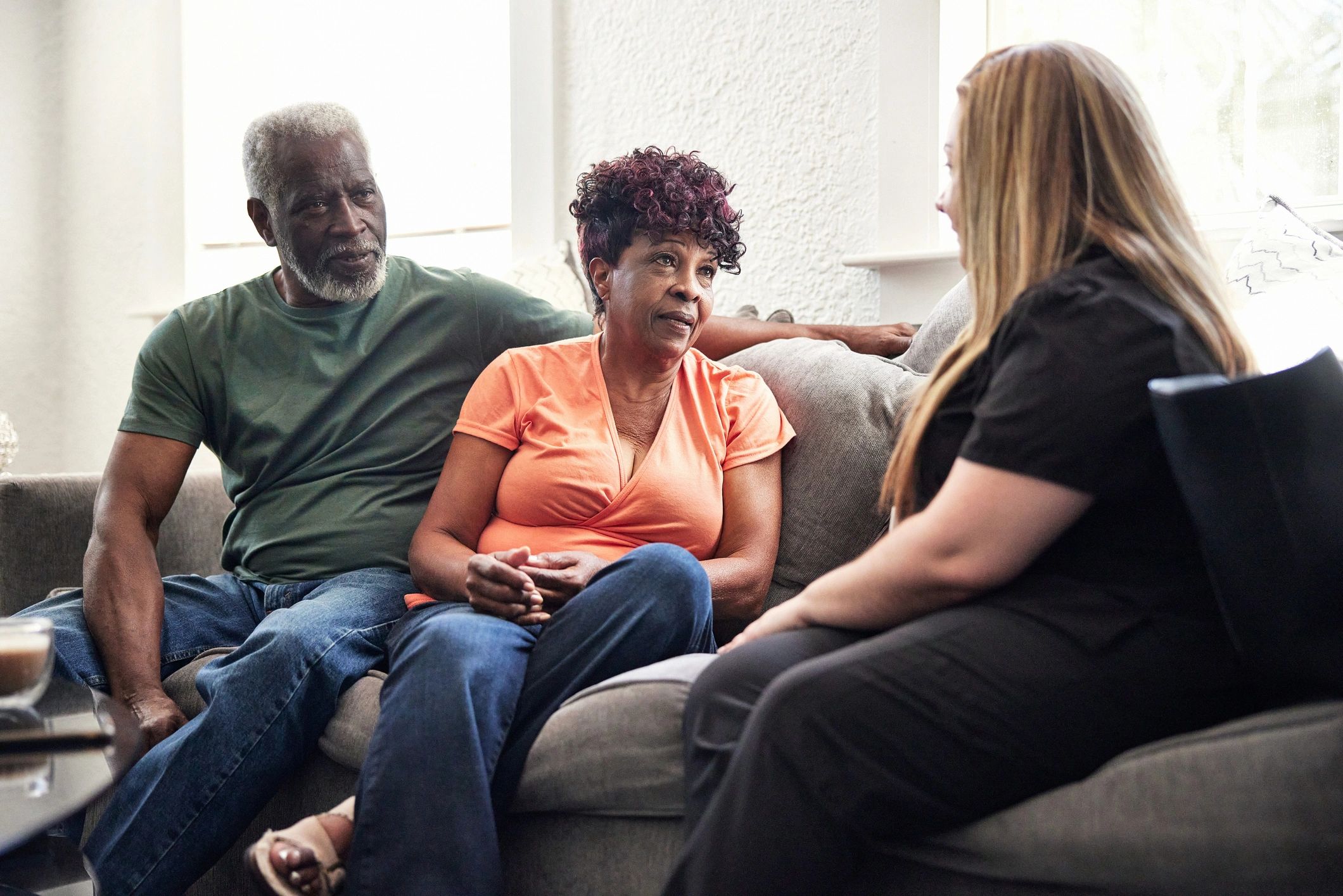 Clients meeting with a healthcare advisor for coverage guidance